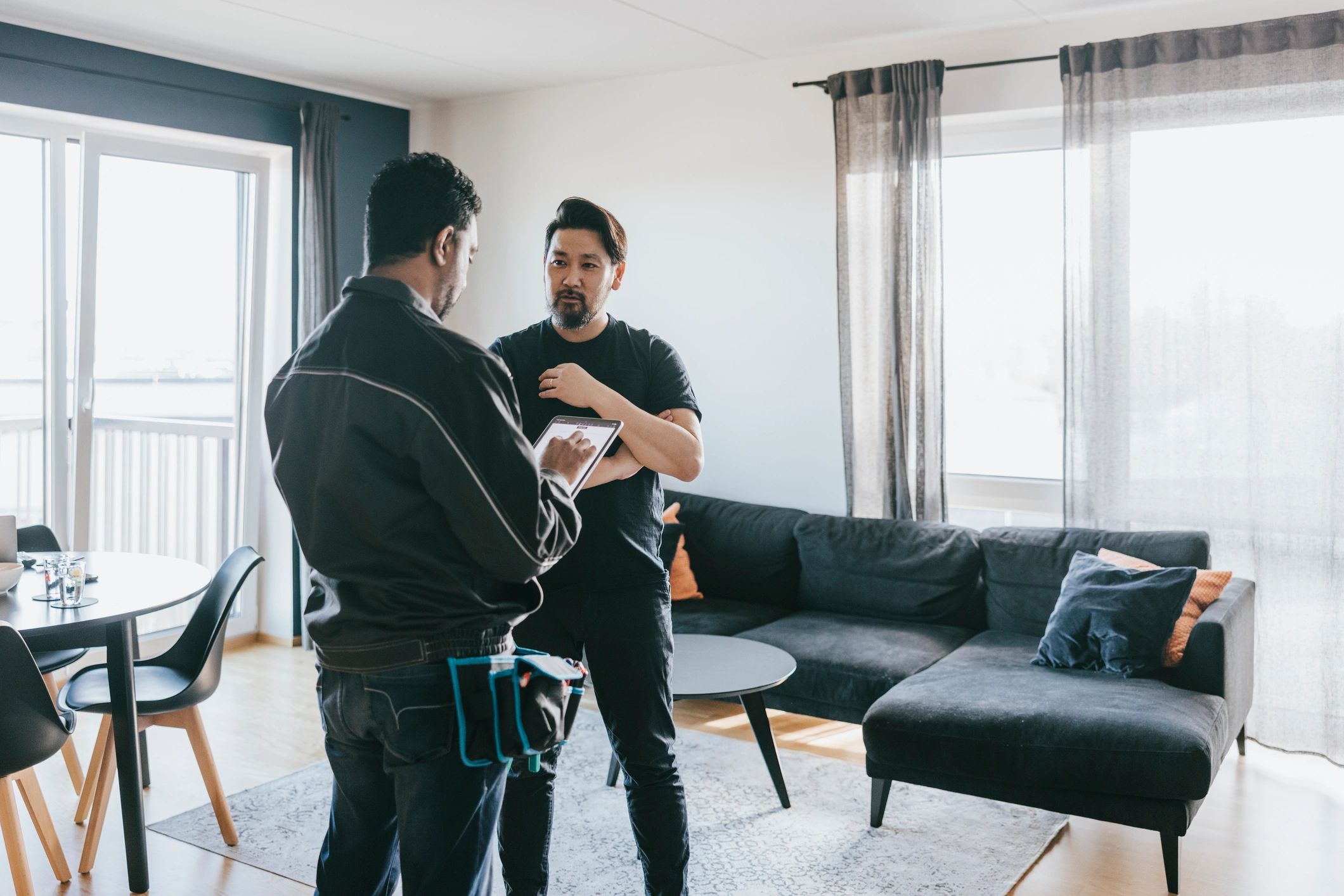 Professional discussing a home visit with a client