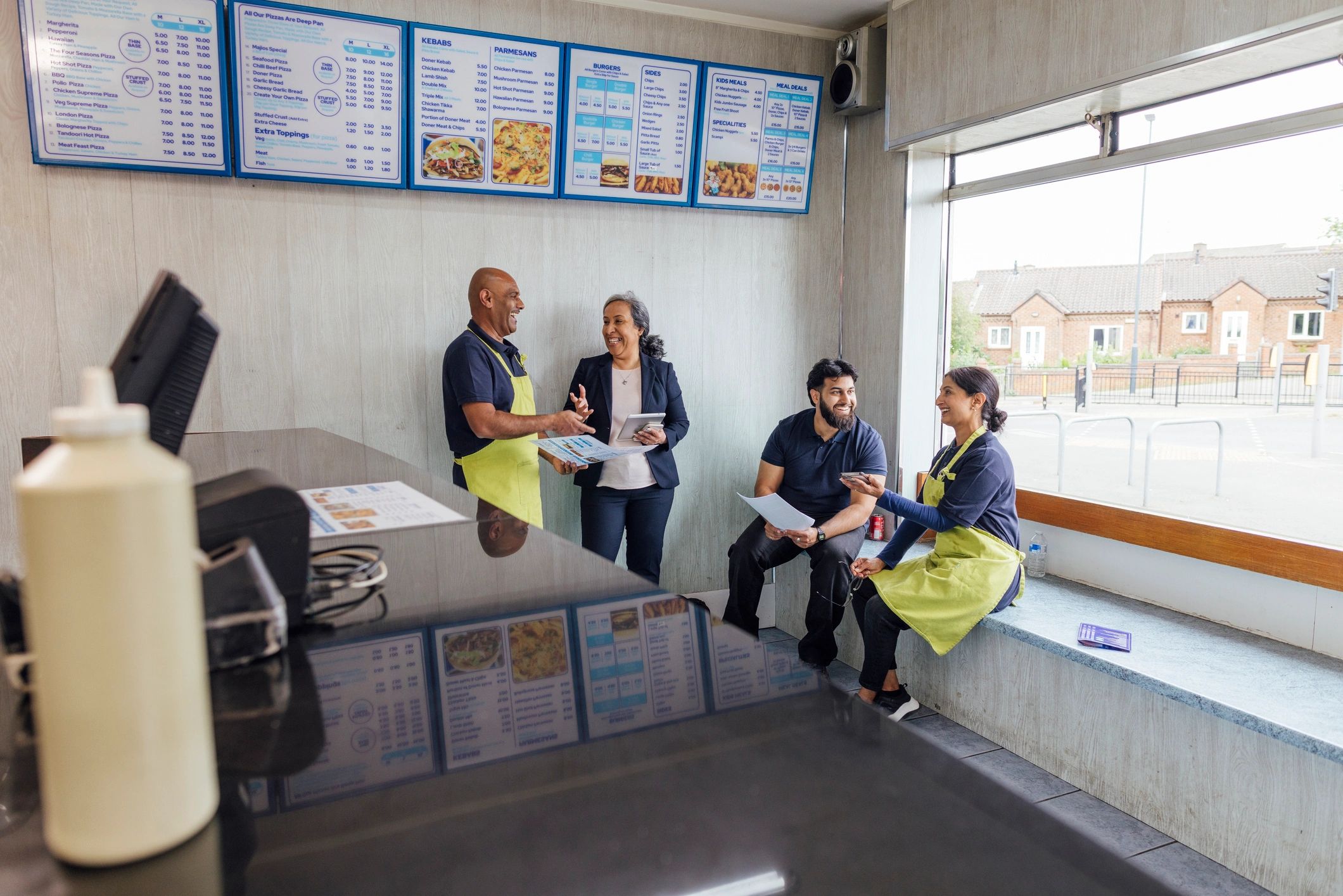 Advisor meeting with local business owners