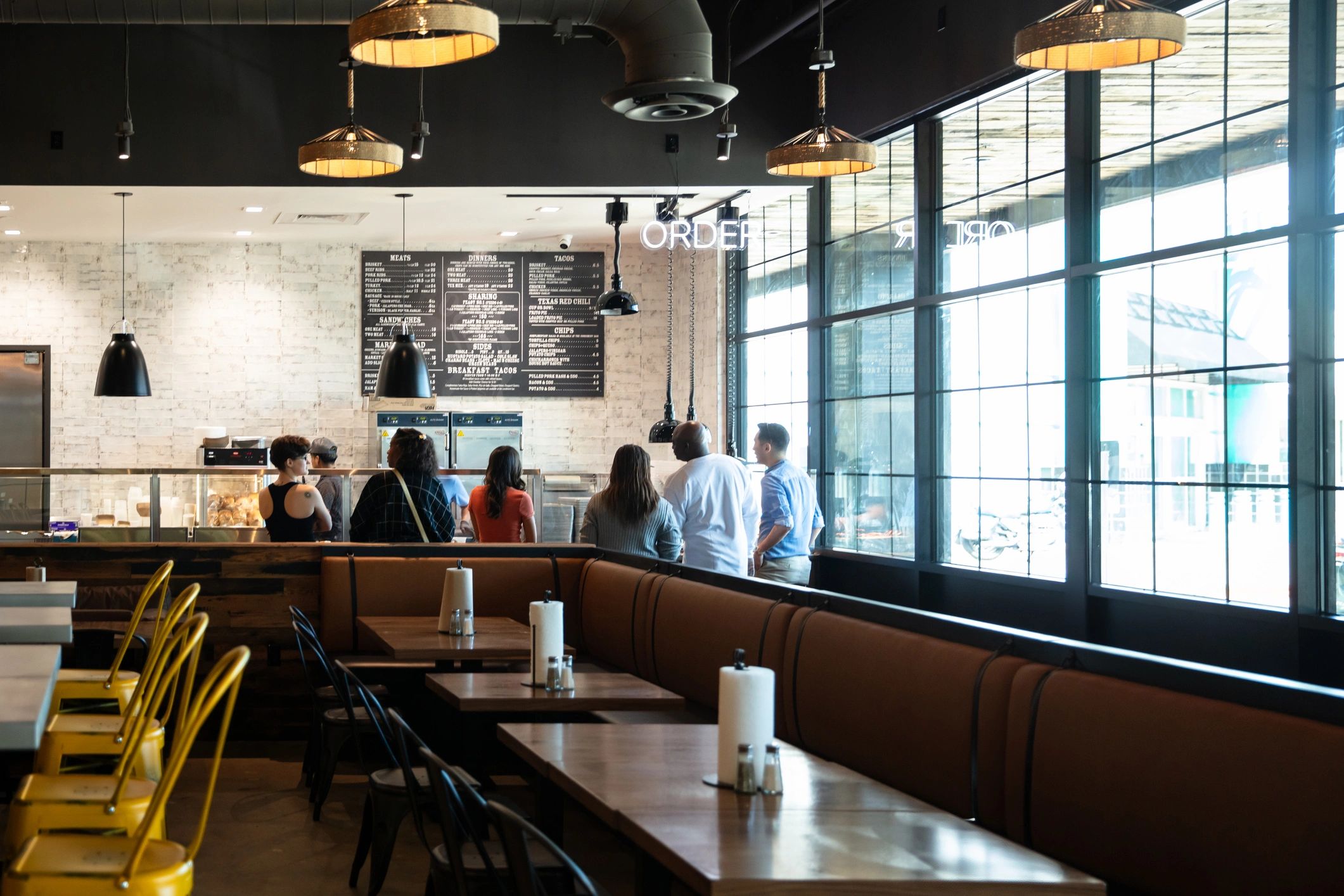 Restaurant dining room with guests gathered indoors